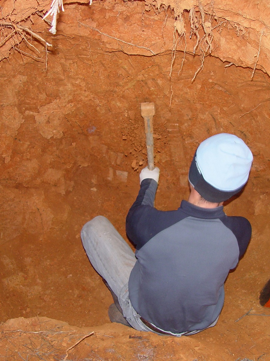 the clay used to seal the bamboo filled with salt is dug out by hand