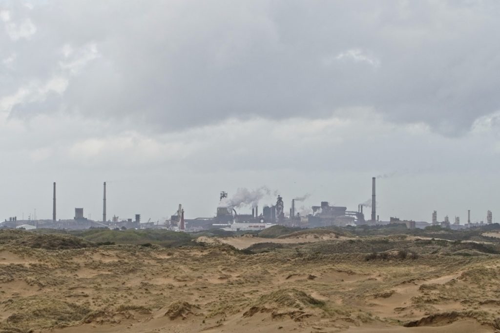 luchtvervuiling door fabrieken vrije radicalen en oxidanten die het lichaam aanvallen.